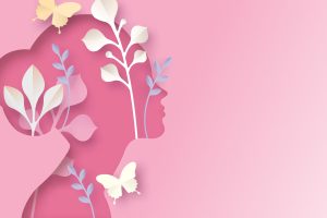 graphic representation of a mother's face in silhouette with flowers leaves and butterflies