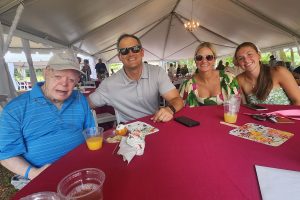 Core member Tommy enjoys the garden party with nephew Adam Smith and his family