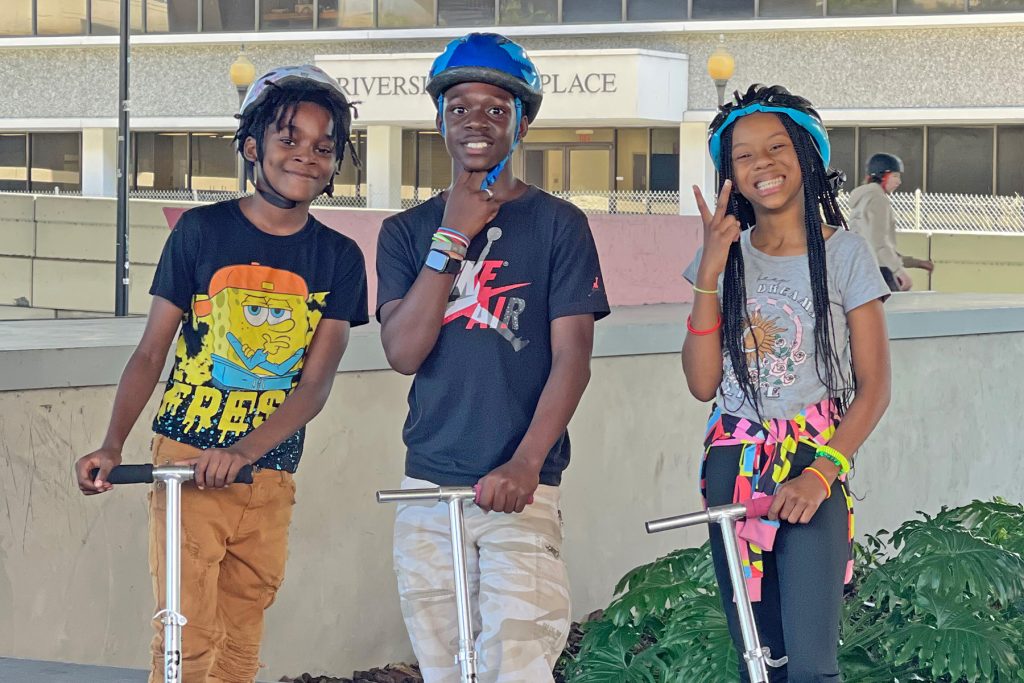 Children with Sanctuary on 8th Street at Riverside’s Artist Walk Skate Park.