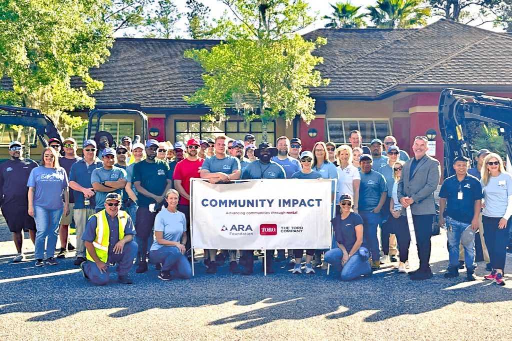 A team of volunteers spend the day beautifying the Youth Crisis Center campus.