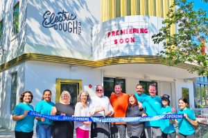 Chef Tom Gray and his team celebrates a June 17 ribbon cutting ceremony for Electric Dough Pizza Co. in the old San Marco Theatre building.