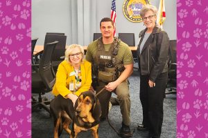 Pepper with ElderSource VP of Communications Andrea Spencer, JSO K9 Officer Clinton Hart and ElderSource CEO Linda Levin