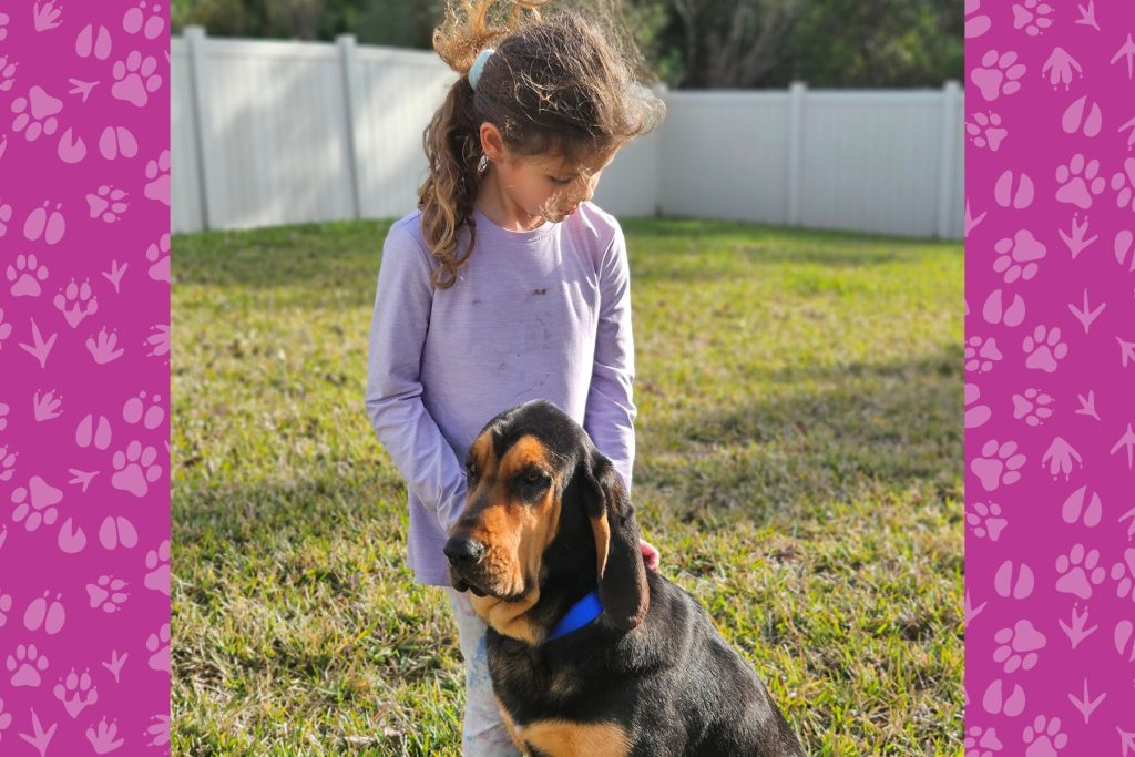 Pepper with her handler’s daughter, Kambri Hart, 7