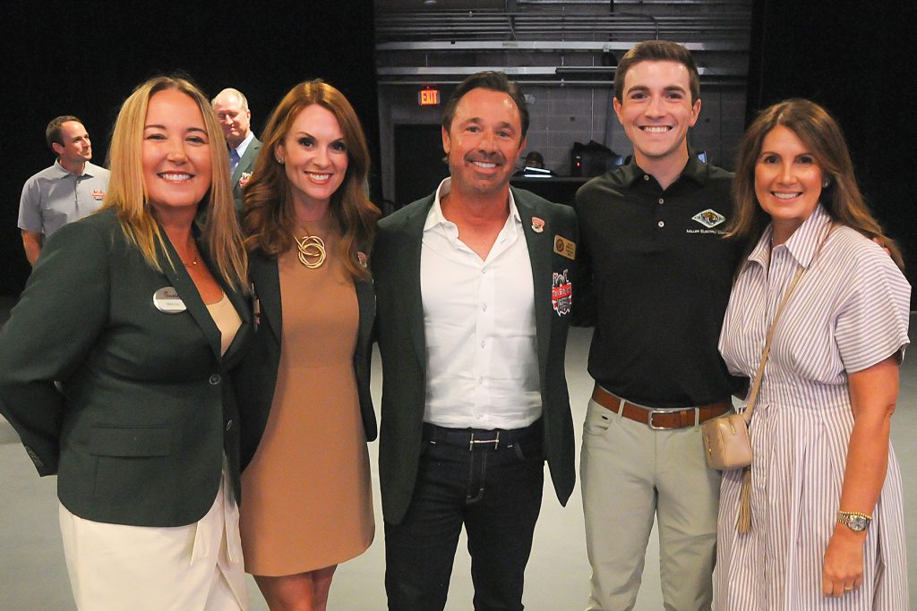 Gator Bowl Sports Green Jacket Committee Members Melinda Sowers, Corie Patton and Alan Worley with Walker Smith and Shelley Smith at the announcement of the 2025 Dream Team