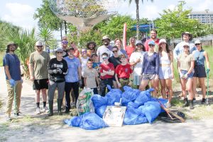 Volunteers at the McCoys Creek Cleanup gather at the end of the event to grab some water and recognize the amount of garbage they’ve kept from going back into the St. Johns River.