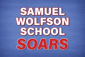 Samuel Wolfson School Soars | words on blue background