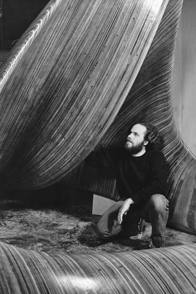 David with one of his sculptures.