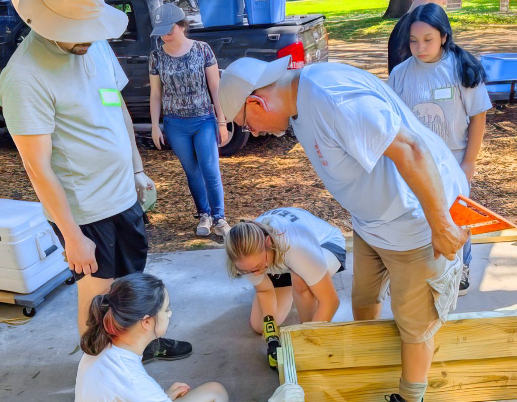 Student and adult volunteers at Community Health Outreach