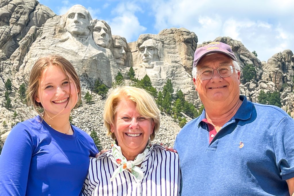 Granddaughter Lilly with Brooke and John at Mount Rushmore