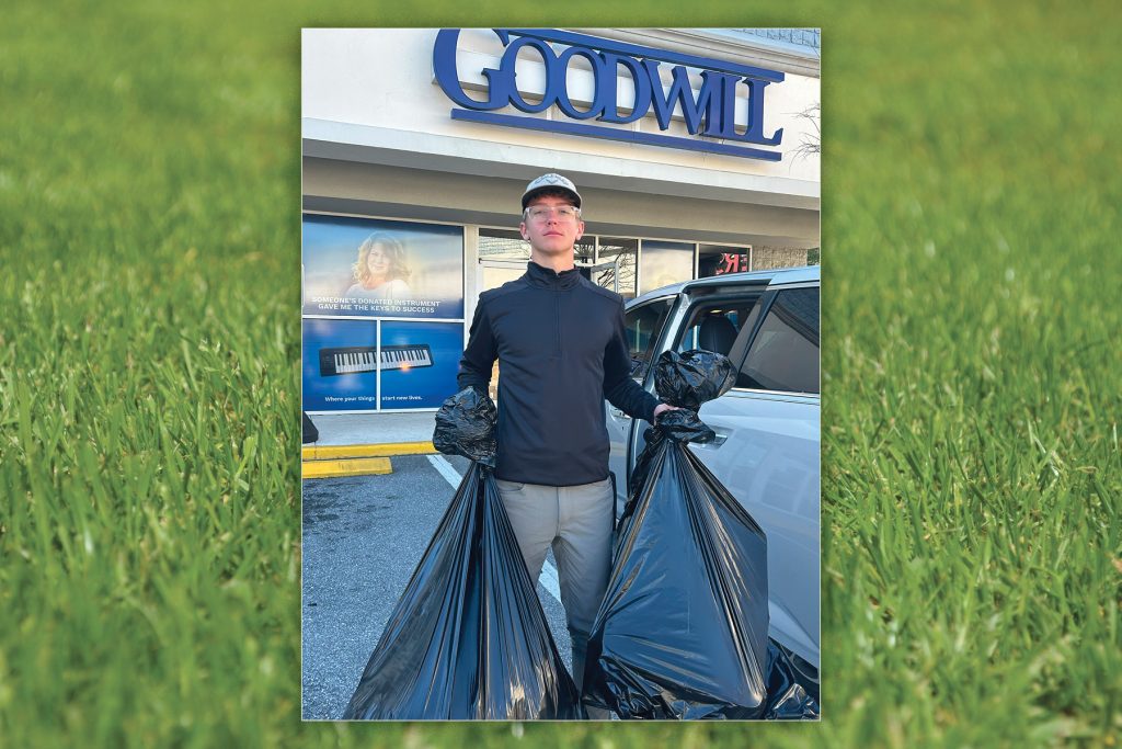 Philanthropy is a major component in the twins’ lives. Jackson is shown here dropping off donations to Goodwill.