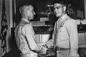 San Marco resident Dick Erickson is congratulated by his instructor on Aug. 12, 1966, upon his designation as a U.S. Naval Aviator after completing flight training. See his story at: vetsmuseum.org/video/richard-erickson-one-limb-down-two-thumbs-up/