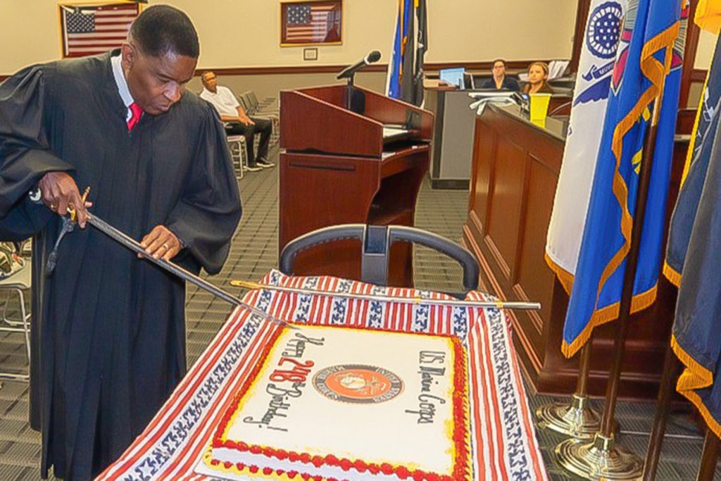 Fourth Judicial Circuit Court Judge Mose Floyd cuts the cake at a birthday party for the U.S. Marine Corps. at Veterans Treatment Court. Judge Floyd is a retired Lt. Col.in the U.S. Marine Corps. See his story at: vetsmuseum.org/video/mose-floyd-we-leave-no-one-behind/