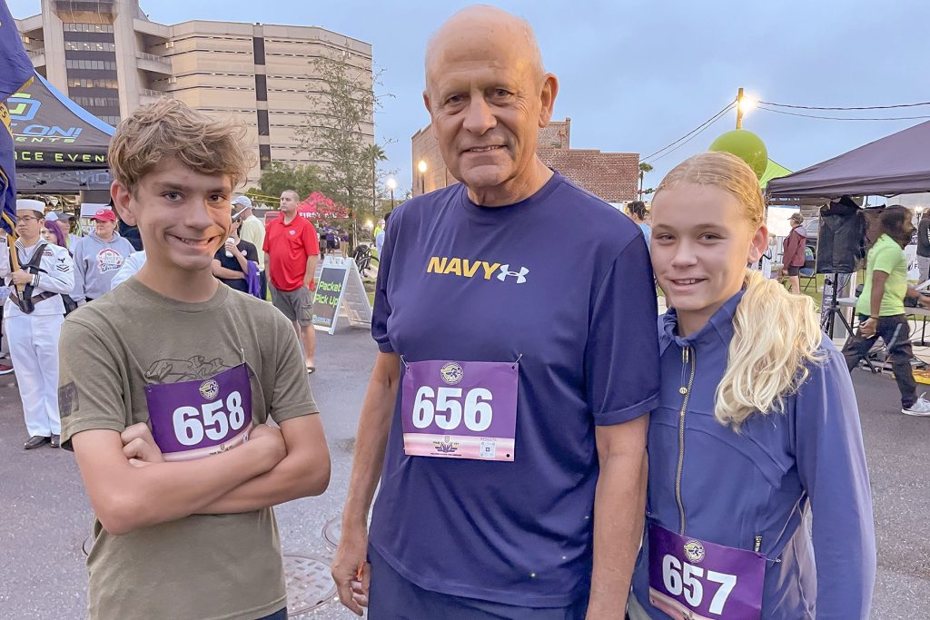 Graham Gorden with grandchildren Holden and Ally before the start of the Oct. 11 Run Up for Heroes 5K.