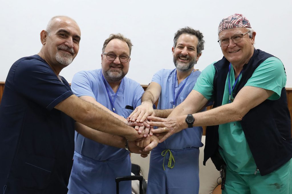 Dr. Samotowka (second from left), with a team of physicians in Syria