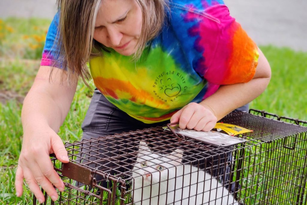 Sejla Hotilovac’s mentor, Summer Crabtree, with trapped kitty.