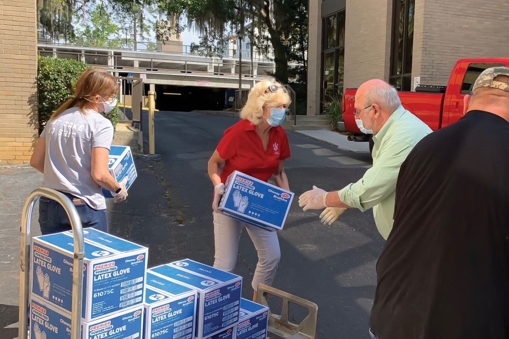Dr. Cauffield helps distribute supplies during the COVID pandemic. She says she's never been more proud of her LSF Health Systems team than she was watching how they responded to the crisis