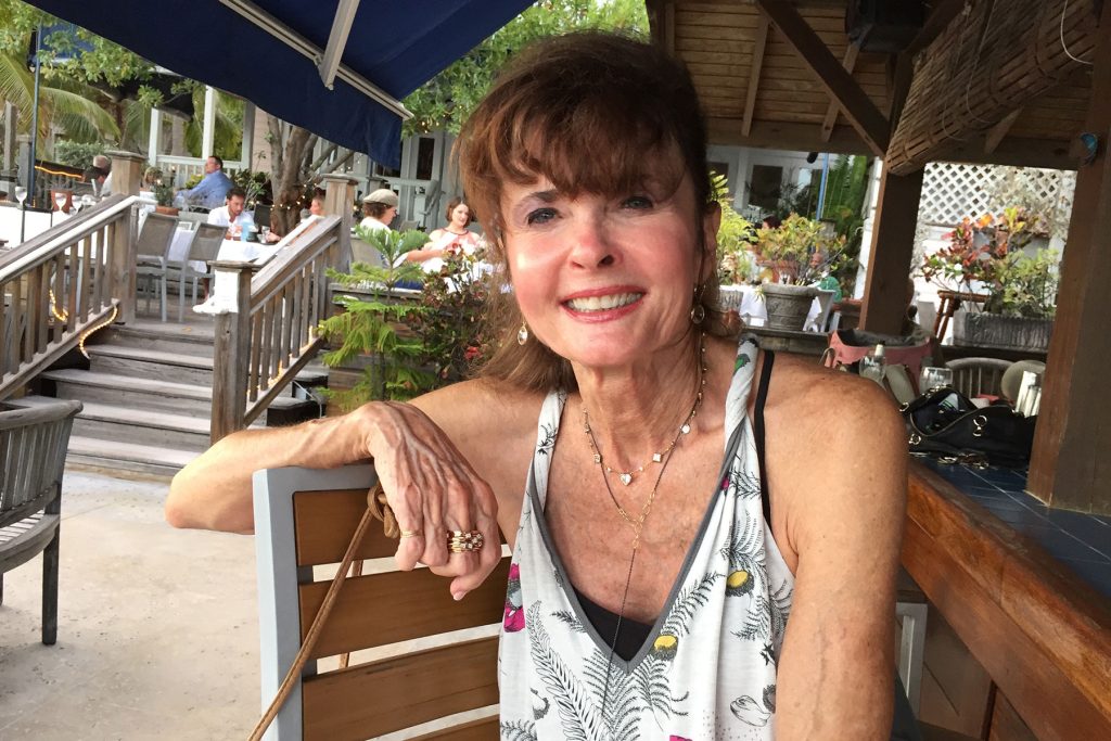 Pete and Sandy enjoy traveling. Sandy is shown here enjoying lunch in Key West.