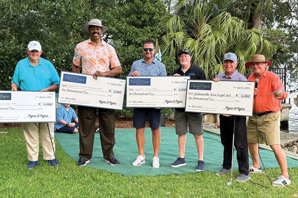 Steve with the celebrity "Yard Golf" winners for charities and Jacksonville Area Legal Aid in 2023
