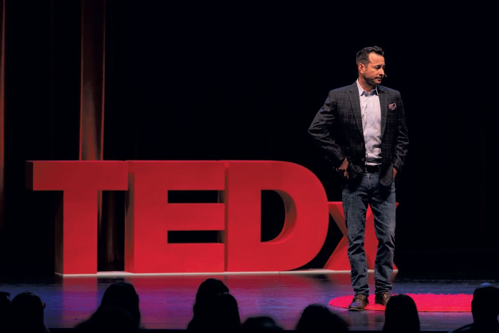 Padlo speaks during a TEDx Talk in which he discussed his struggles with drugs and alcohol and explained how recovery tools shaped his life