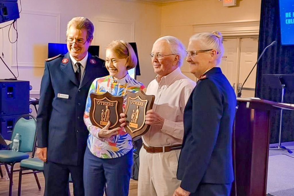 Cecilia and Richard receiving the Salvation Army’s highest honor in December 2024.