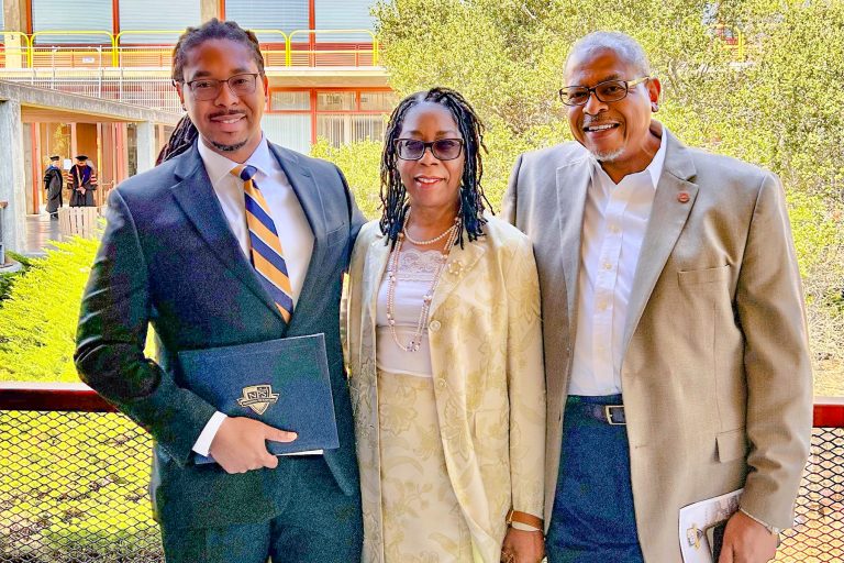 Proud father Harold E. Davis (right) and mother Phyllis Bell Davis (center), made the trip to Monterey, CA for their son’s, Harold, graduation ceremony.