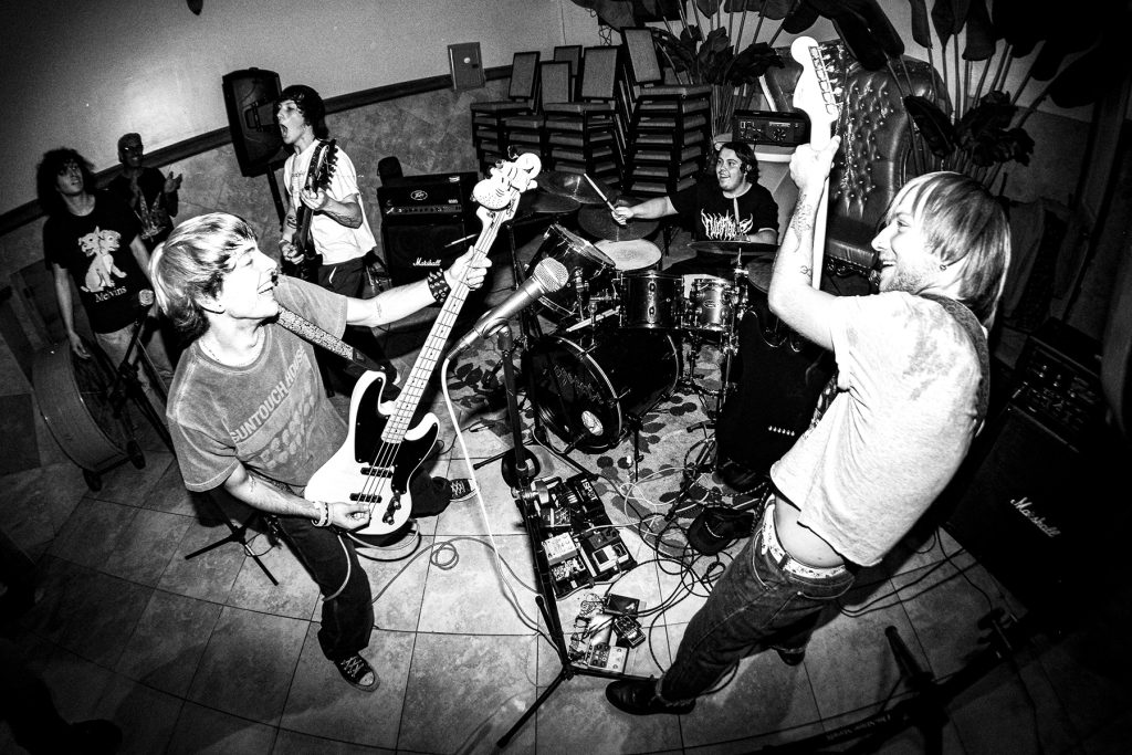 band playing music and smiling