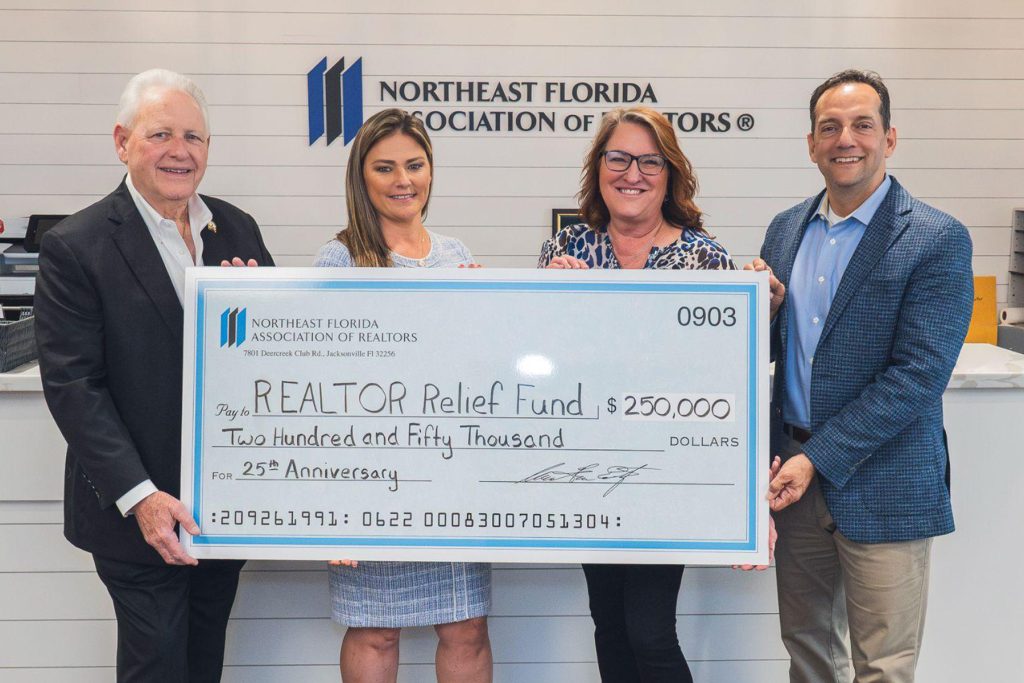 NEFAR CEO Glenn East and Treasurer Tiea Vincent with President Kim Knapp and Past President Mario Gonzalez