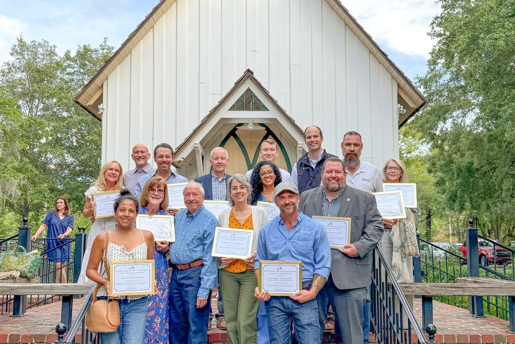 The 2026 Beautification Awards recipients gather on the steps of Preservation Hall after the SMPS Annual Meeting on May 28.