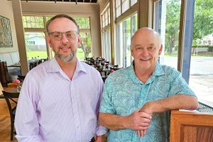 Hughes Brown and his father, Jerry, at the newly opened Oxford Place