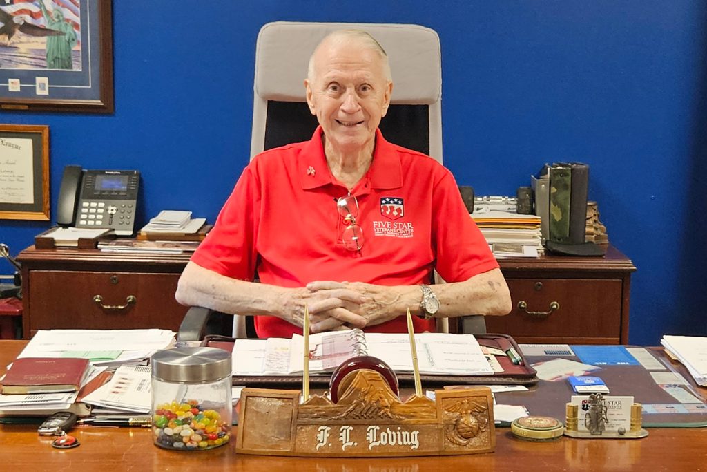 Len Loving at desk